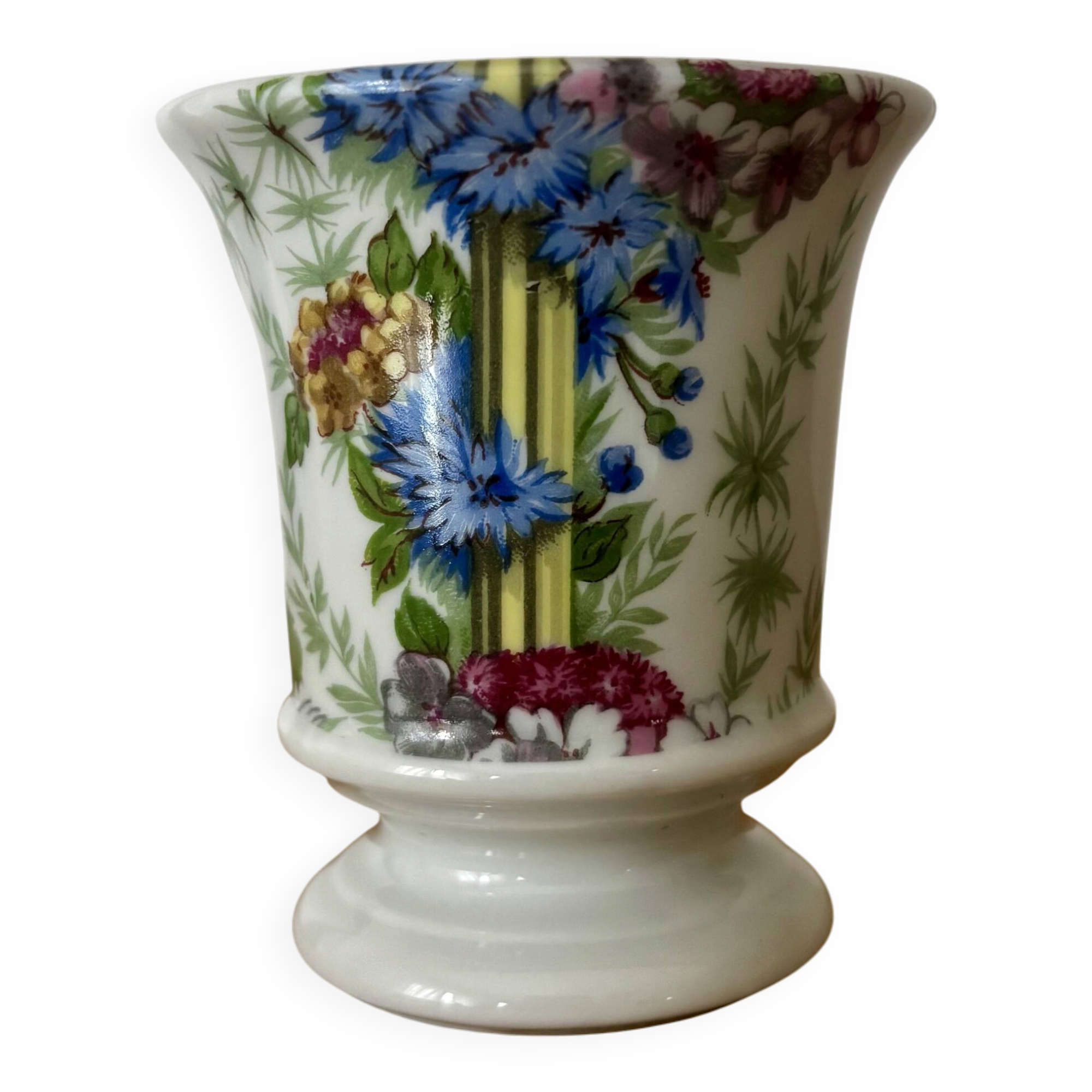 Adorable small porcelain vase from Paris with floral decoration.