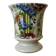 Adorable small porcelain vase from Paris with floral decoration.