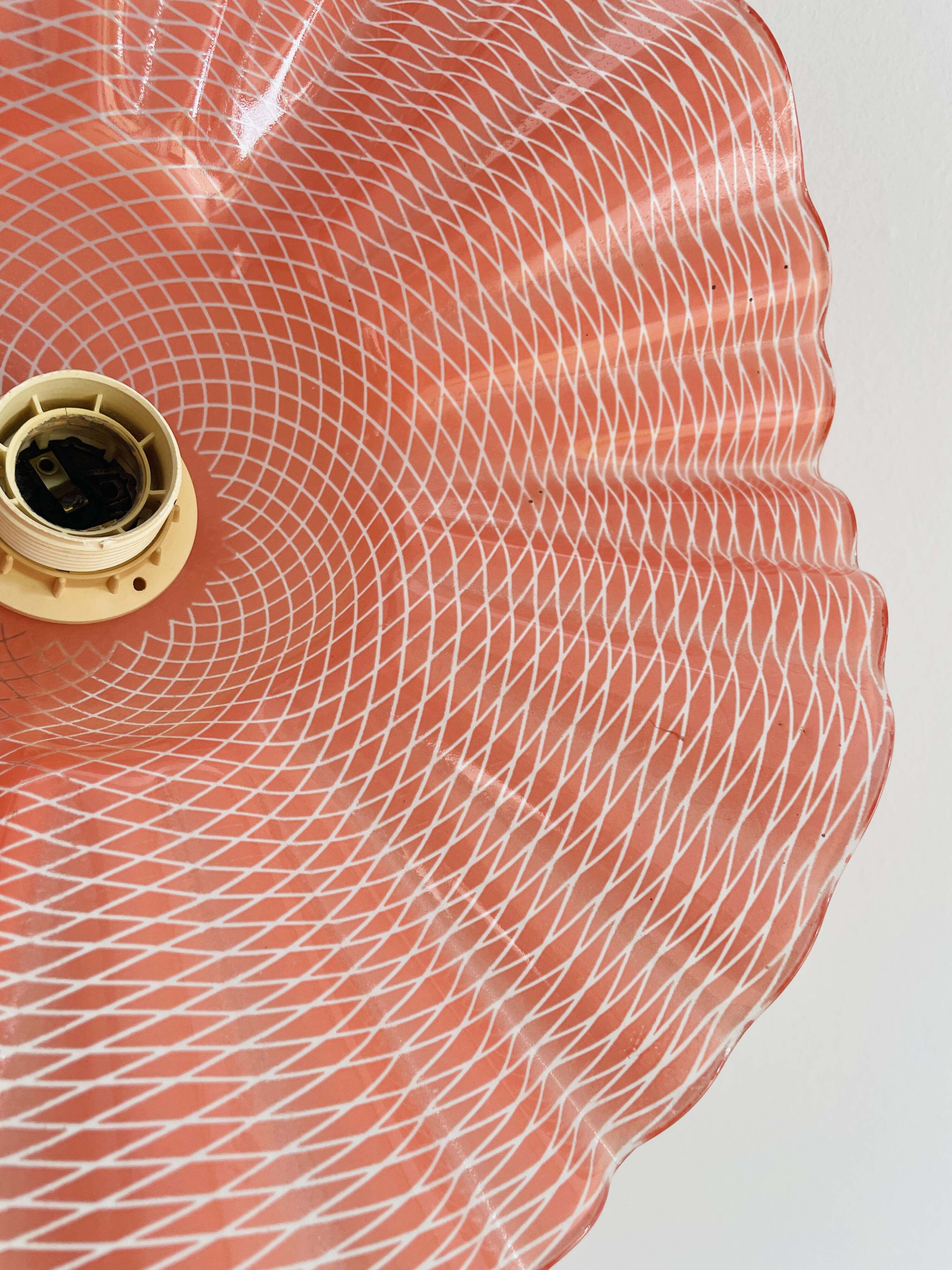 Pink molded glass pendant light