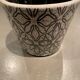 Enamelled earthenware pot