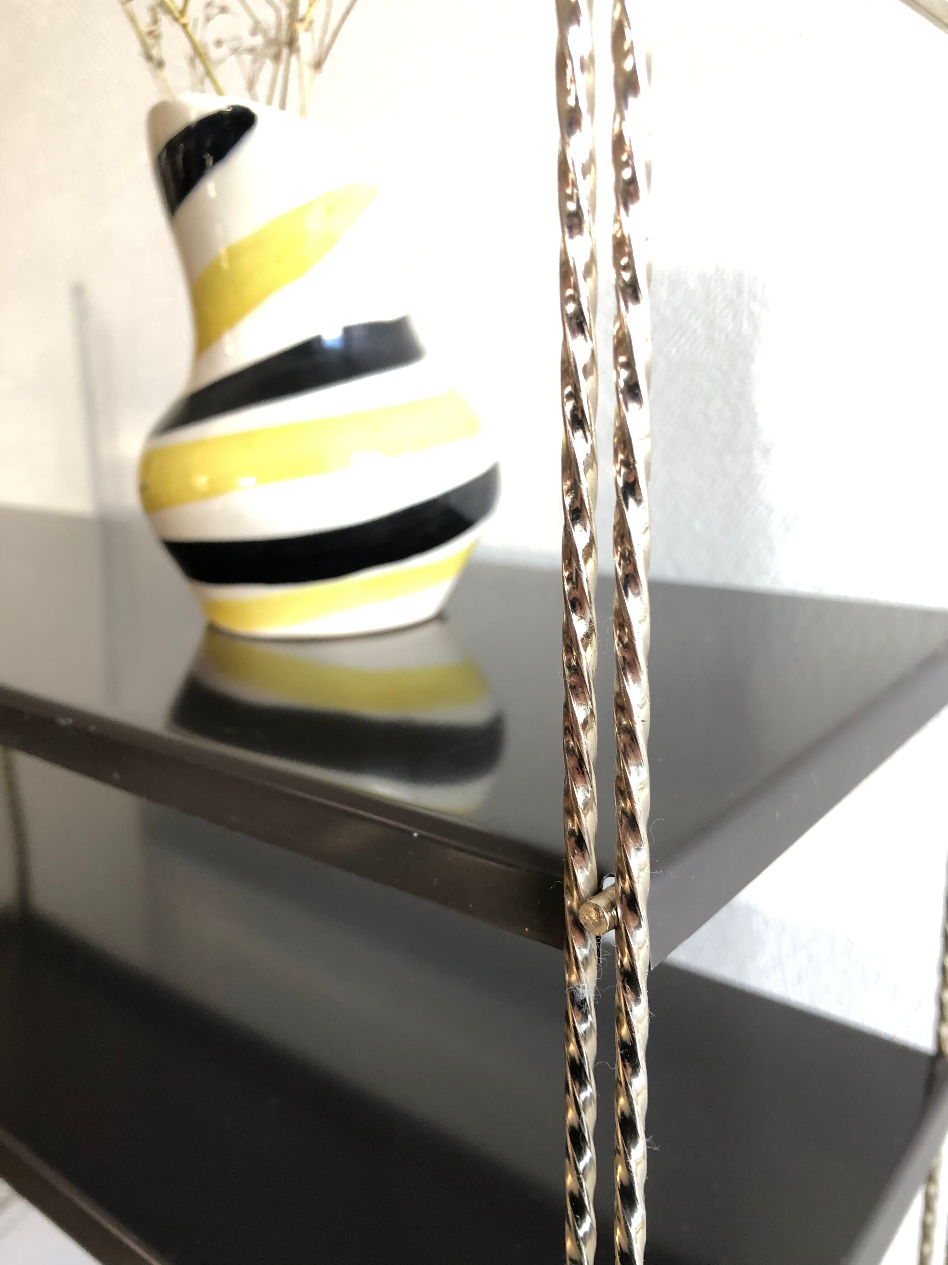 String shelf creation mofp gold and black