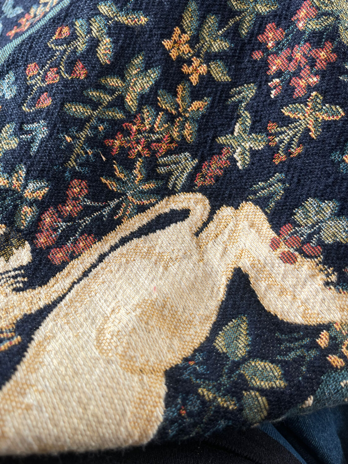 Wall tapestry panel.