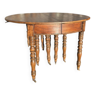 12-foot round oak table with 7 extensions / 20 people