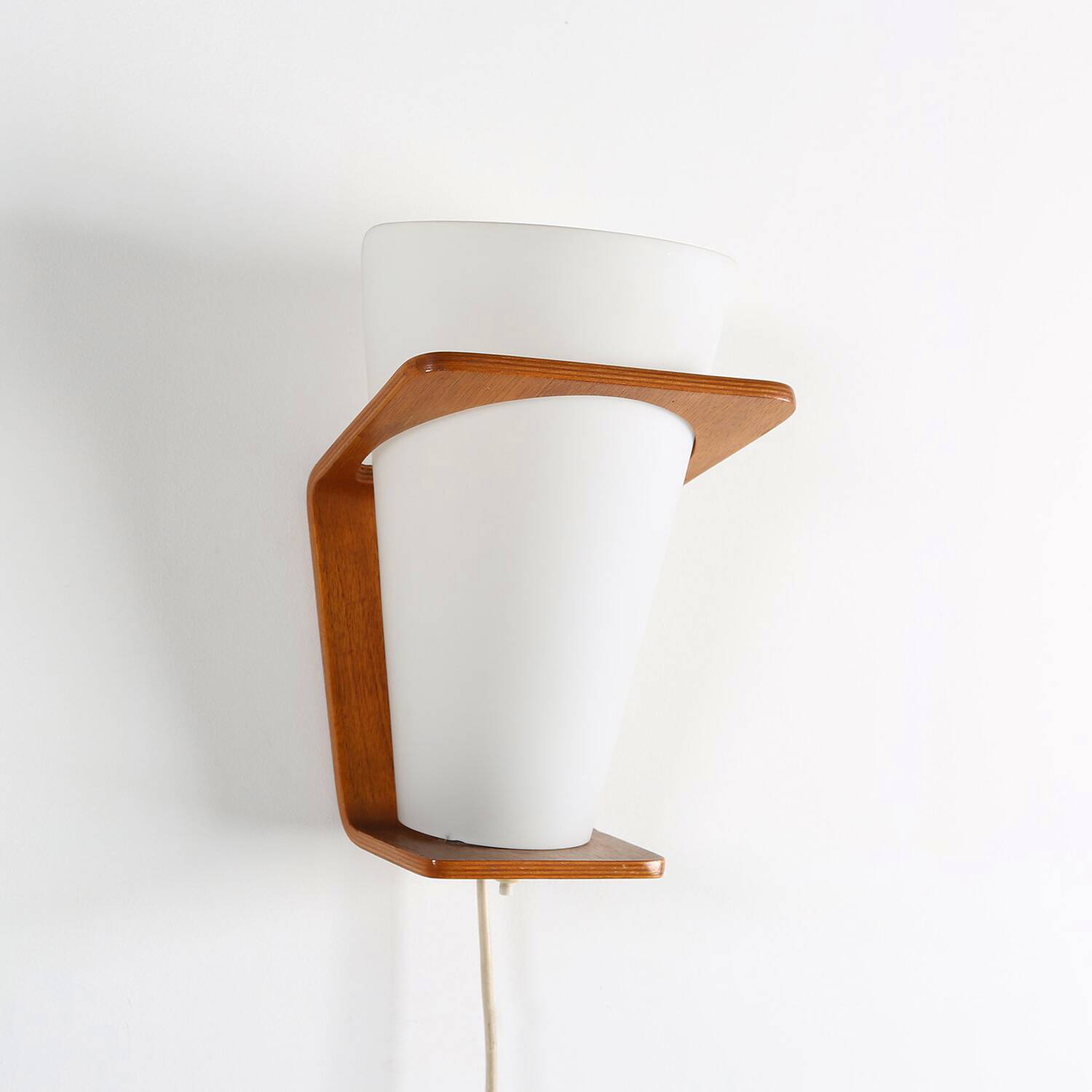 Wall Lamp in Curved Teak Plywood by Louis Kalff for Philips, 1959