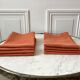 Lot de 8 serviettes de table en lin ajourées couleur terracotta