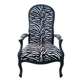Voltaire armchair upholstered with zebra pattern fabric