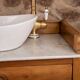 Marble and wood washbasin furniture in Louis-Philippe style.