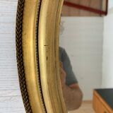 Oval mirror Louis XVI style in gilded wood