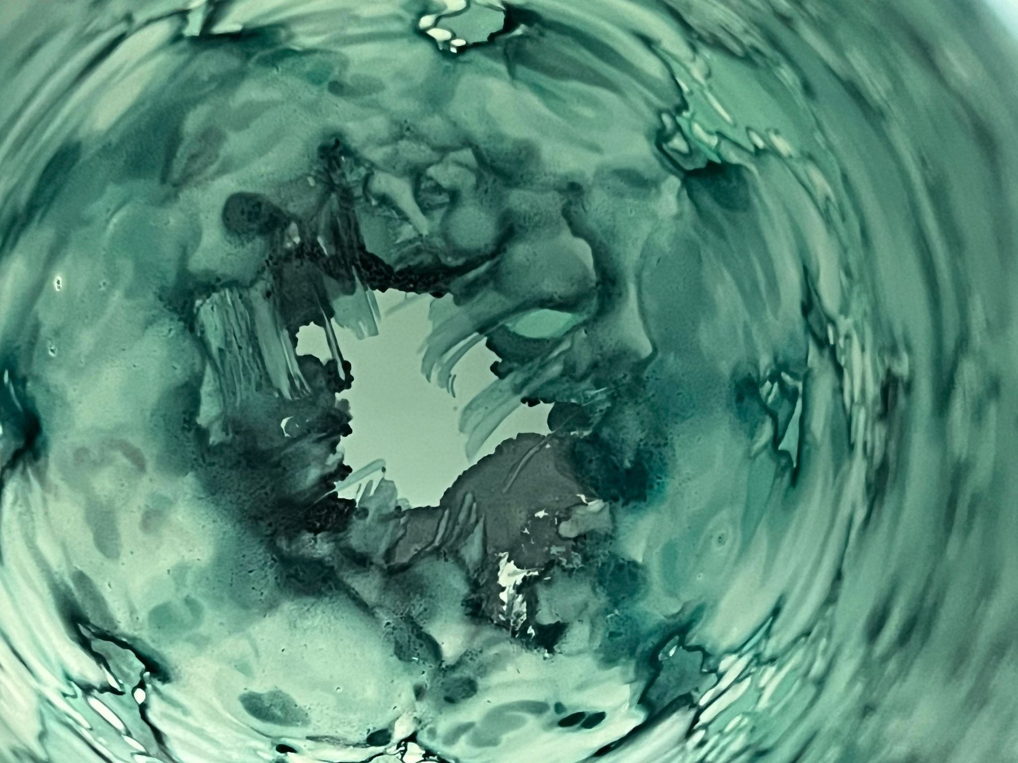 Blue speckled and marbled glass vase