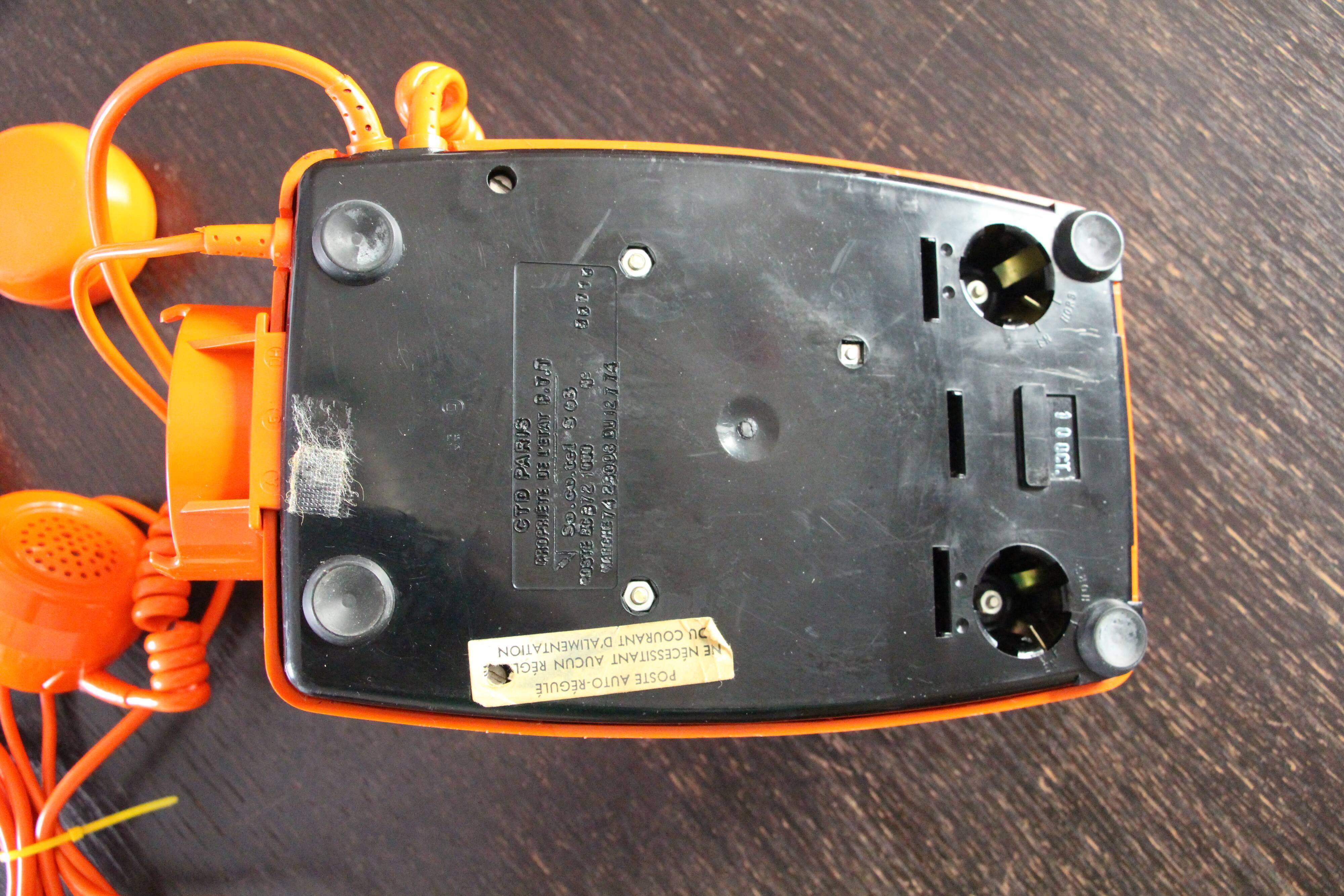 Vintage phone with orange dial 70's