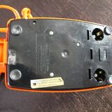 Vintage phone with orange dial 70's