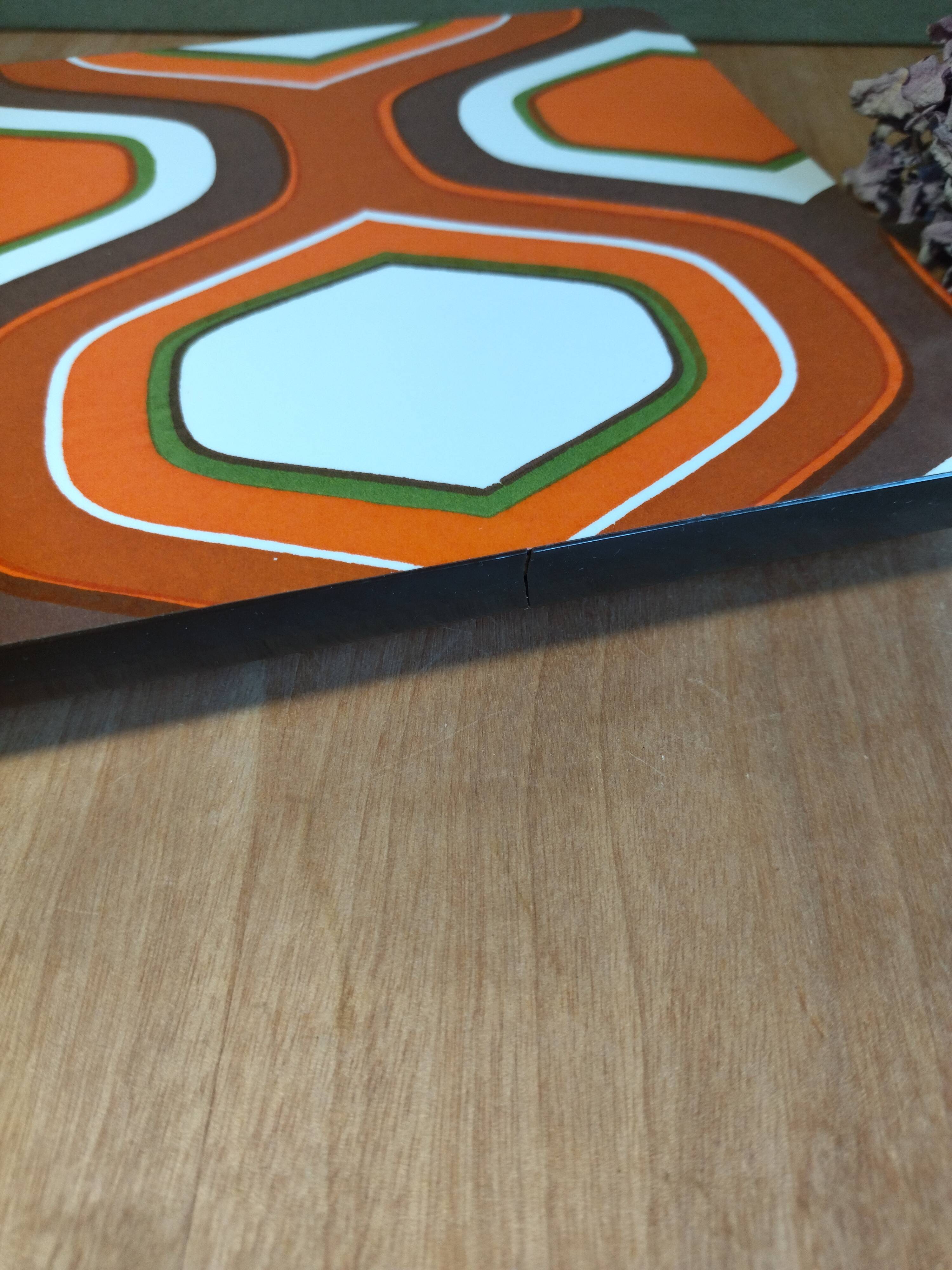 Vintage formica orange and white underside