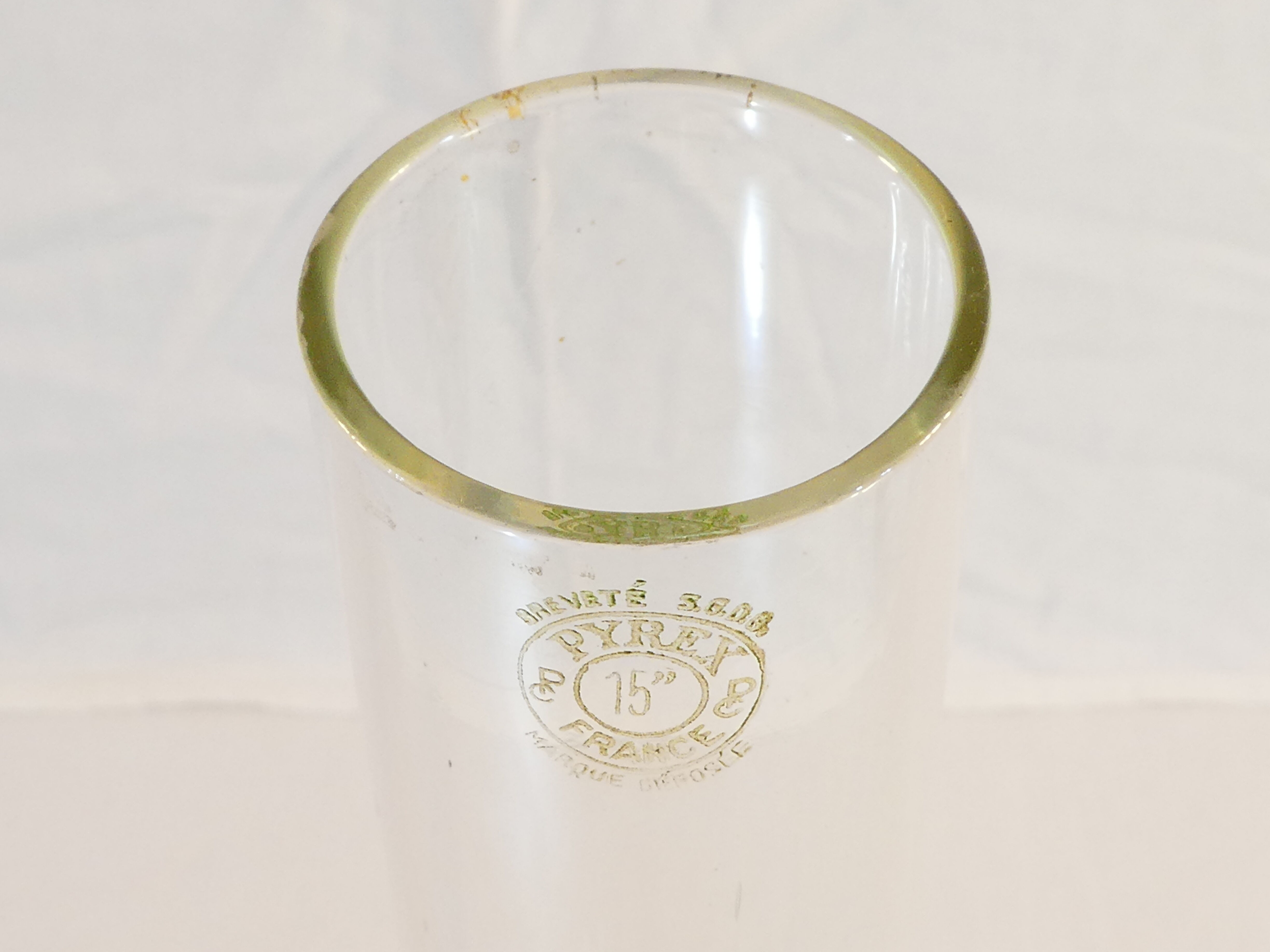 Ancient lampe a petrole in green opaline