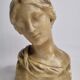 Bust of a young woman in Florentine style wax, 19 cm