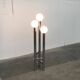 Vintage German floor lamp from the space age of the 1970s in glass and metal.