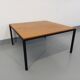 Vintage modernist square coffee table in teak and black metal from the 60s