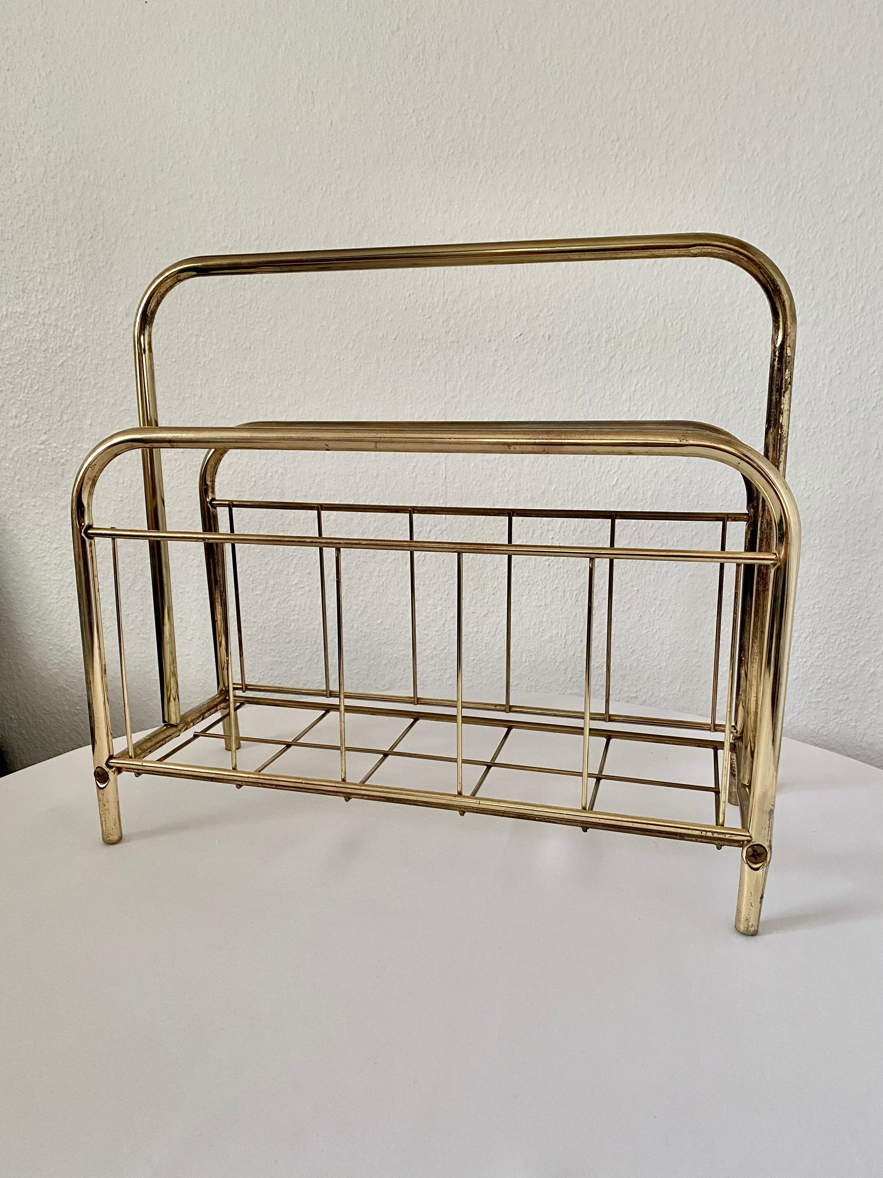 Gilded metal magazine door