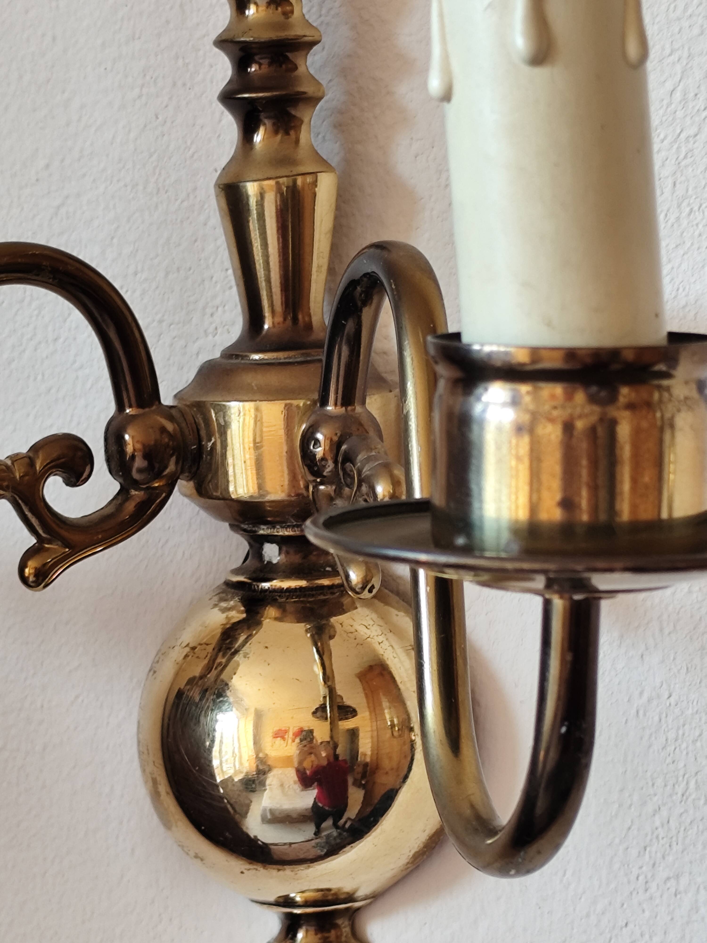 Pair of Dutch style 2-light brass wall lights