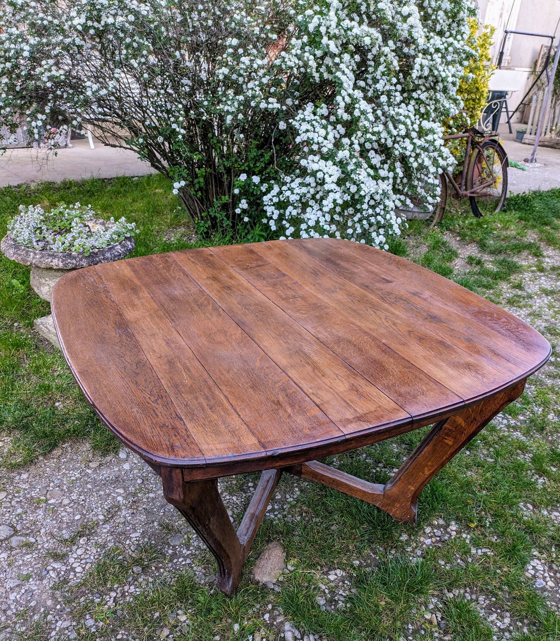 Antique Art Deco table with Eiffel-style legs in solid oak