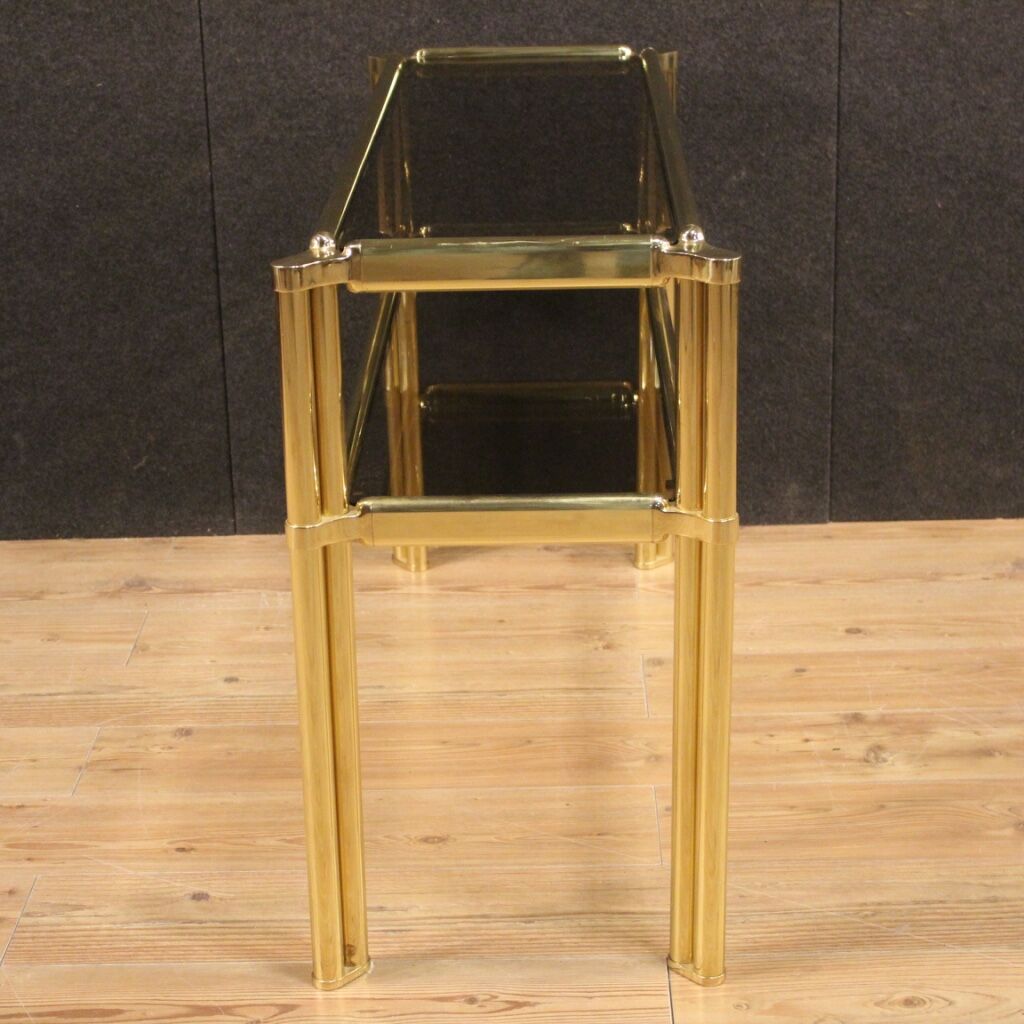 Italian console in gold metal