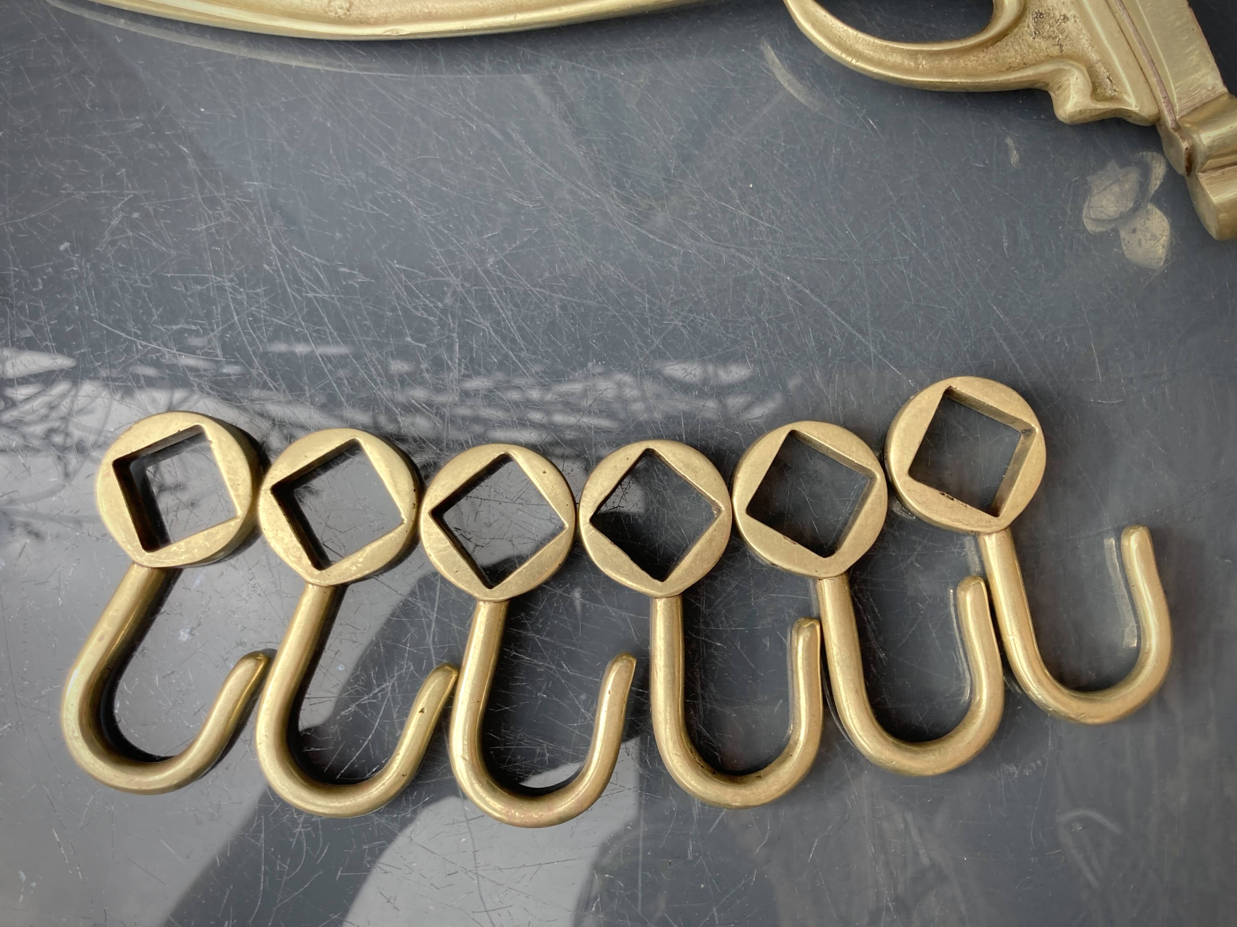 Art-deco wall-mounted coat rack in brass