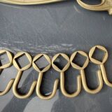 Art-deco wall-mounted coat rack in brass