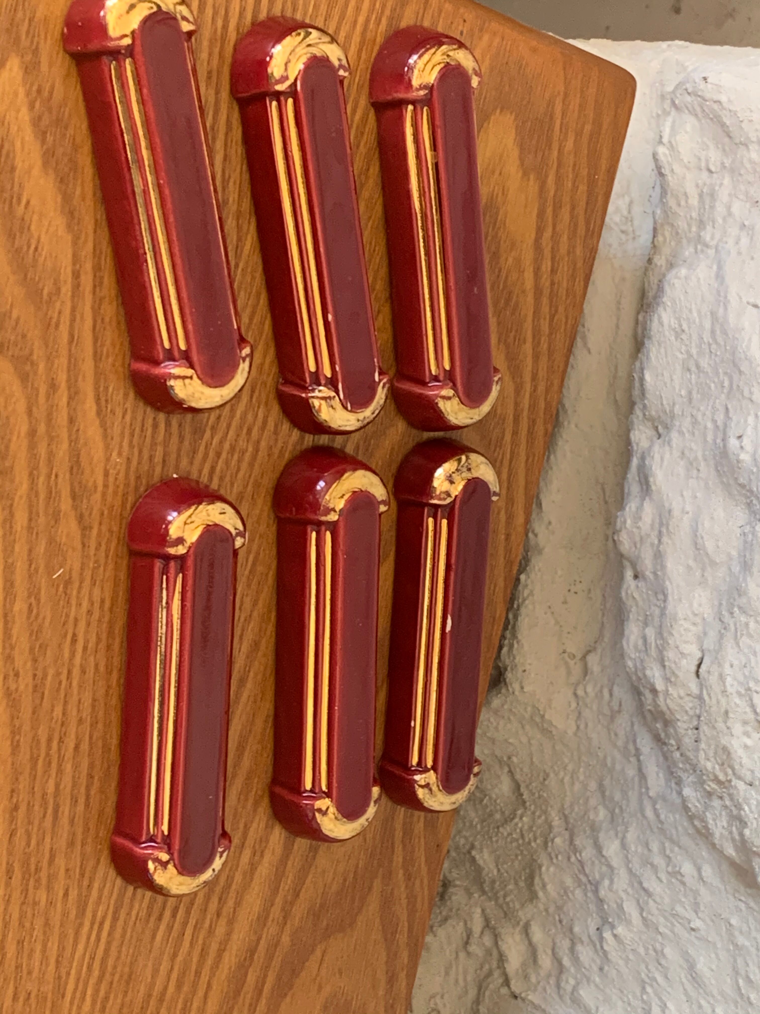6 knife holders in burgundy glazed ceramic with art deco gold edging