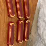 6 knife holders in burgundy glazed ceramic with art deco gold edging