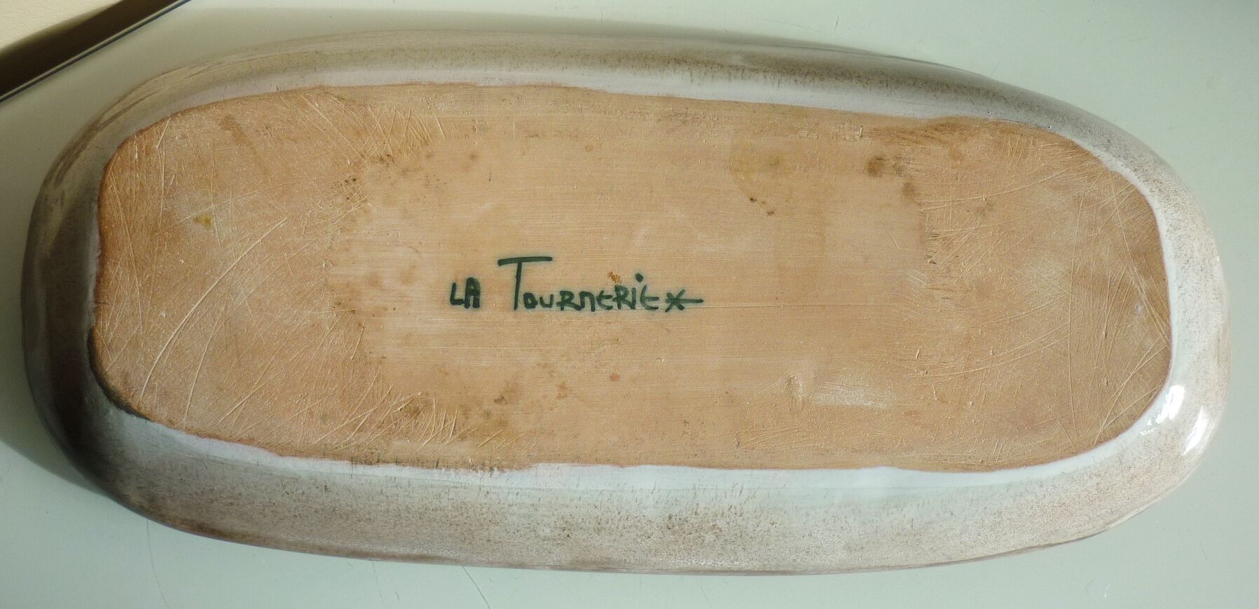 Glazed art ceramic dish, 1950s/1960s, signed La Tournerie, stylized decoration