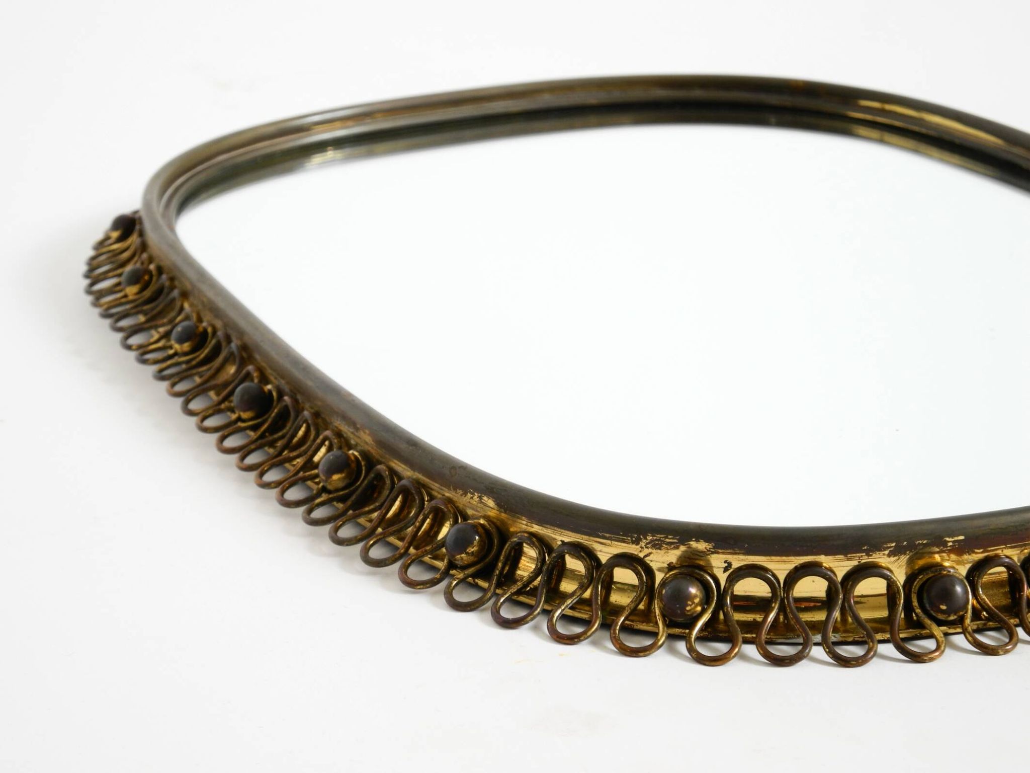 Mid century brass wall mirror by Josef Frank for Svenskt Tenn Sweden