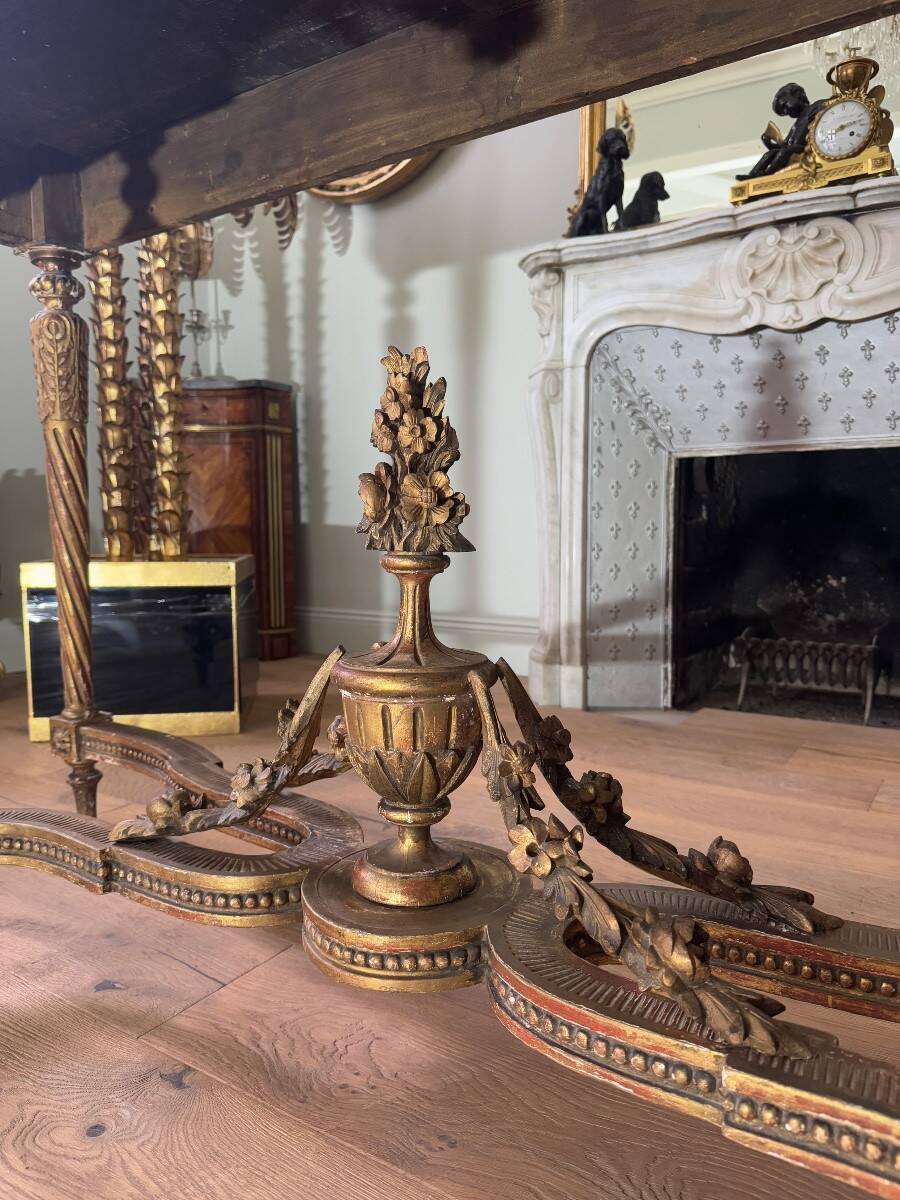 Console with 4 legs from the end of the 19th century in gilded wood in the Louis XVI style.