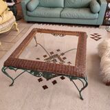 Coffee table in wrought iron, rattan and glass