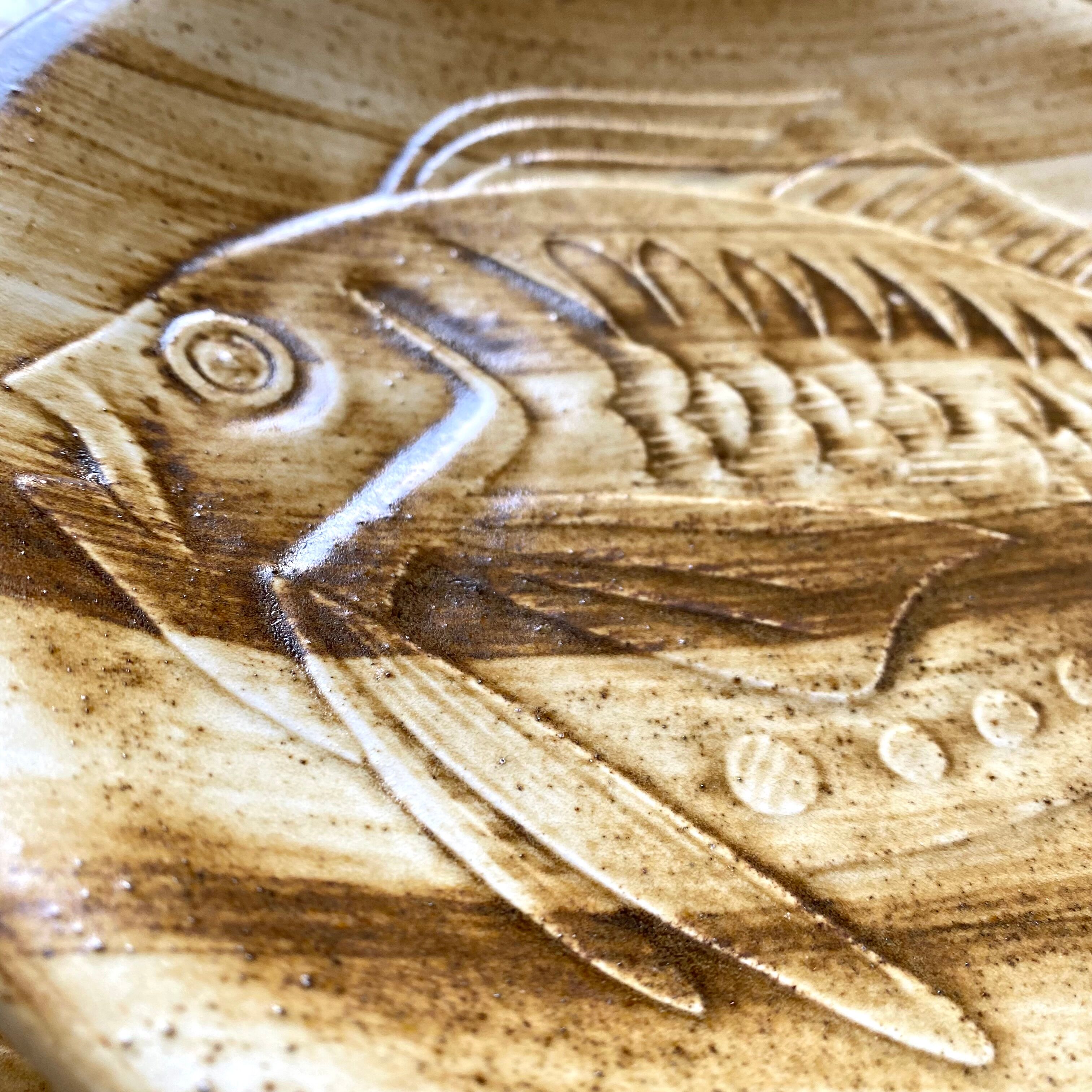 Longchamp dinner plates with fish decor