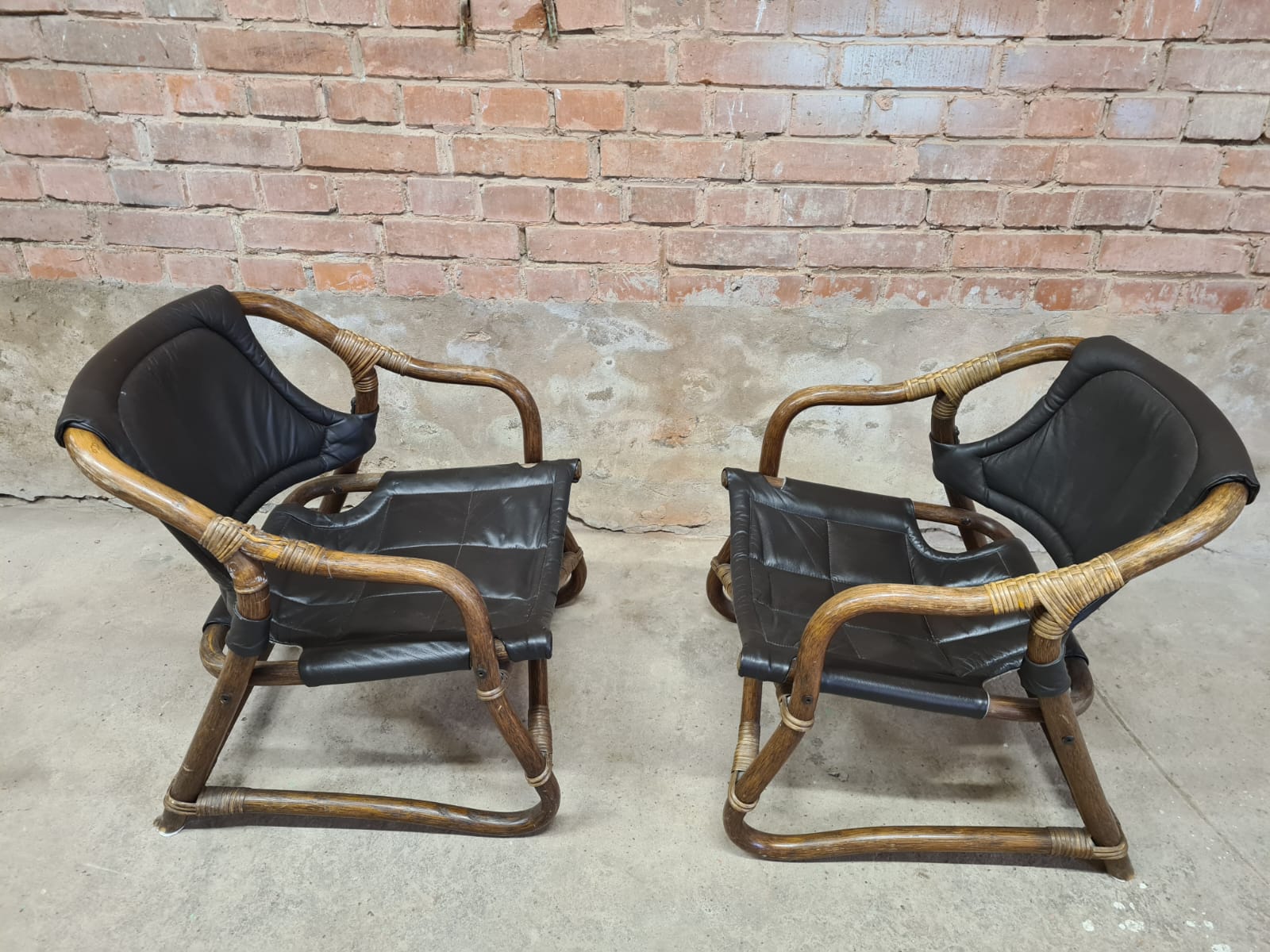 Pair of vintage skaï bamboo armchairs