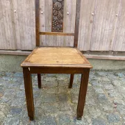 Vintage Art Deco chair in carved oak from the 1930s.