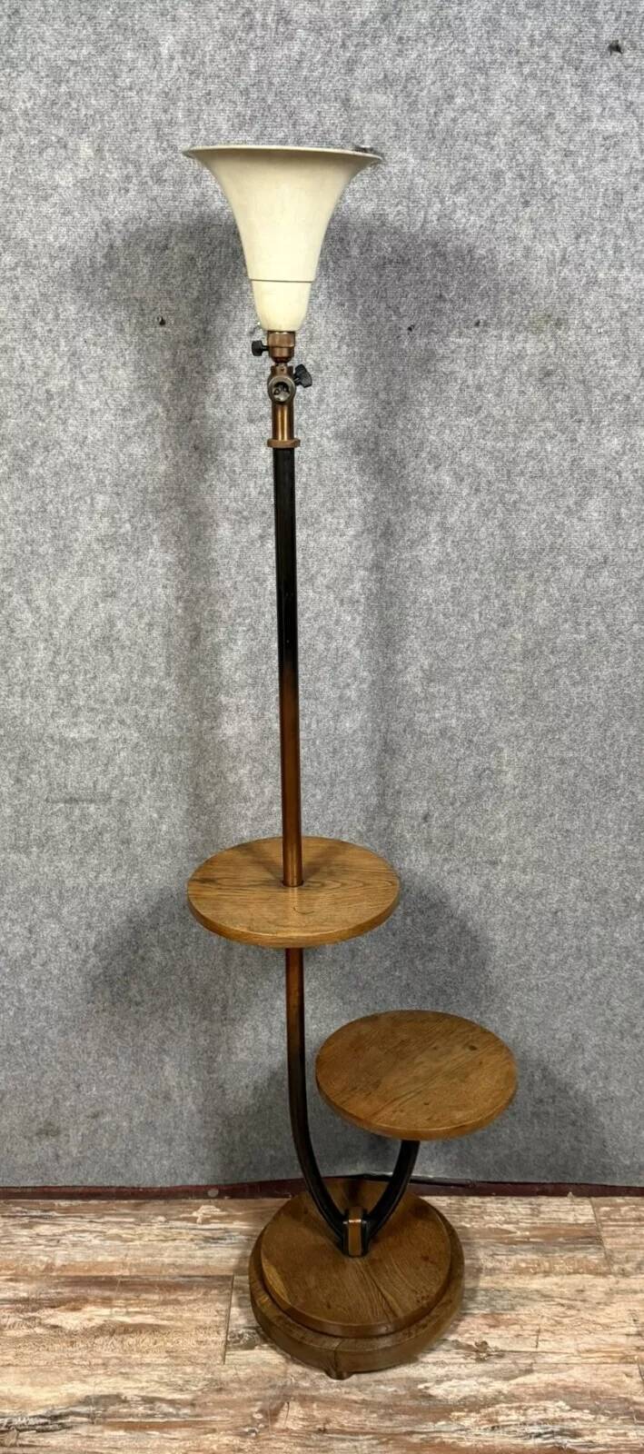 According to Mazda: Art Deco period mahogany floor lamp circa 1930