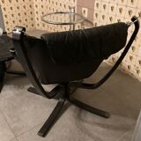 Leather Falcon armchair and footrest