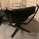 Fauteuil et repose pieds ottomane Falcon en cuir