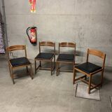 Set of four vintage chairs with retro design skai seats