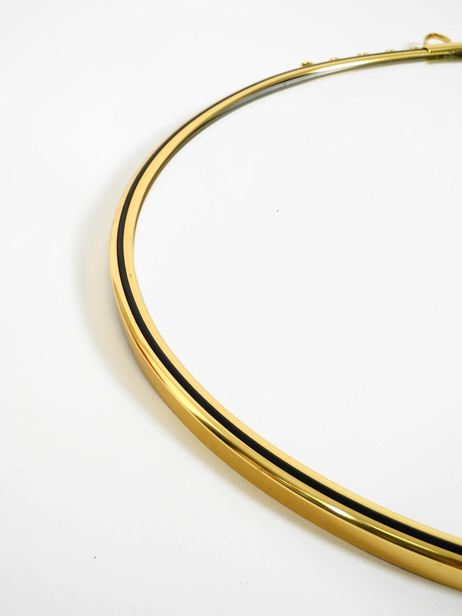 Beautiful, heavy Mid-Century Modern brass wall mirror by Lenz, 1964