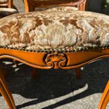 8 cherry wood chairs in Louis XV style with velvet upholstery.