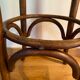 Paire de tabourets de bistrot en bois tourné et assise en skaï rouge XX siècle