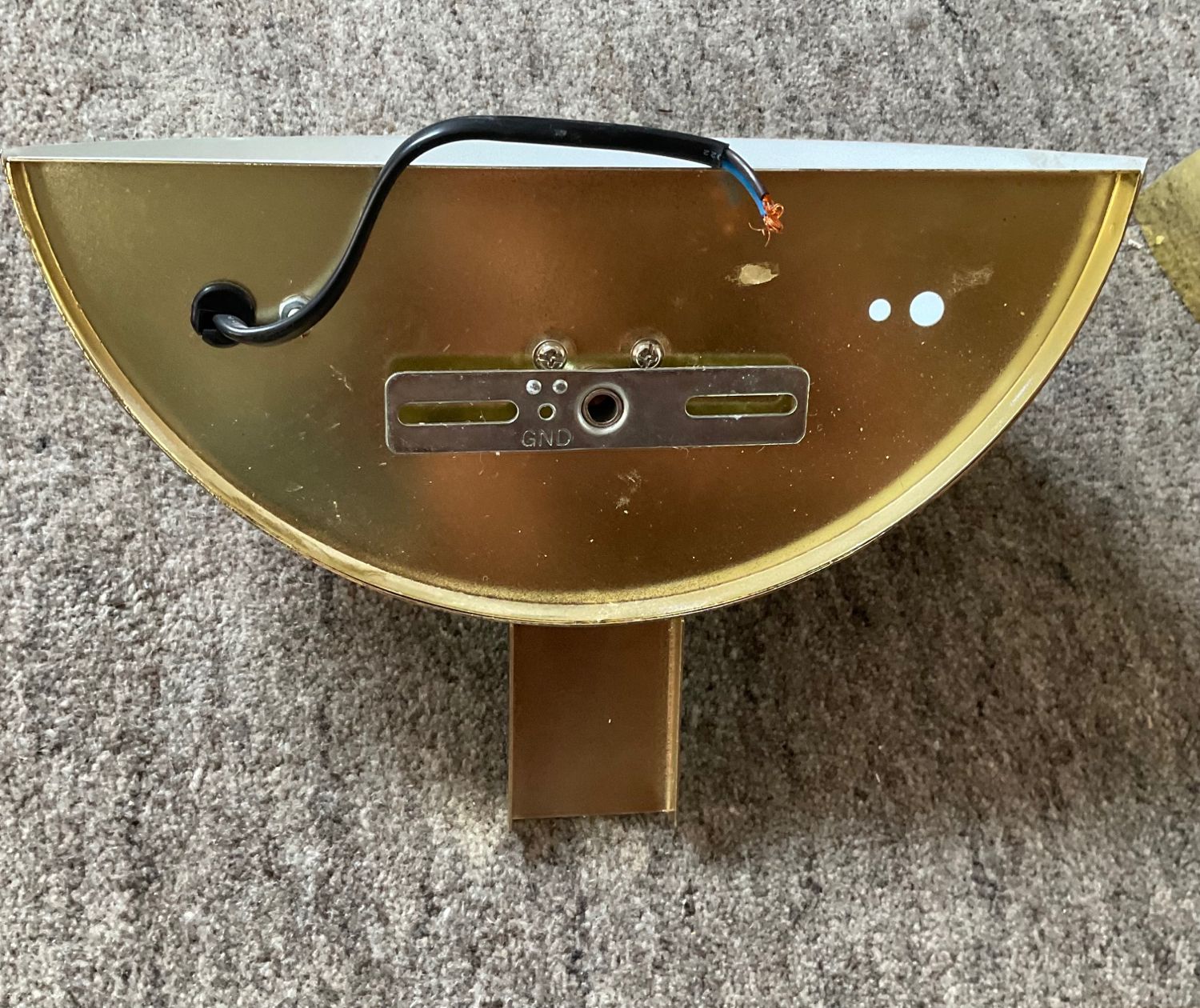Pair of Hollywood Regency half-moon wall lamps in gilded metal and plexiglass