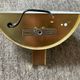 Pair of Hollywood Regency half-moon wall lamps in gilded metal and plexiglass
