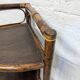 Rattan corner shelf
