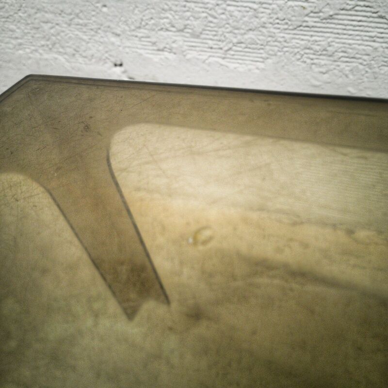 Smoked plexiglas coffee table