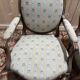 Pair of cabriole armchairs with medallion backs from the Louis XVI period, stamped OT.