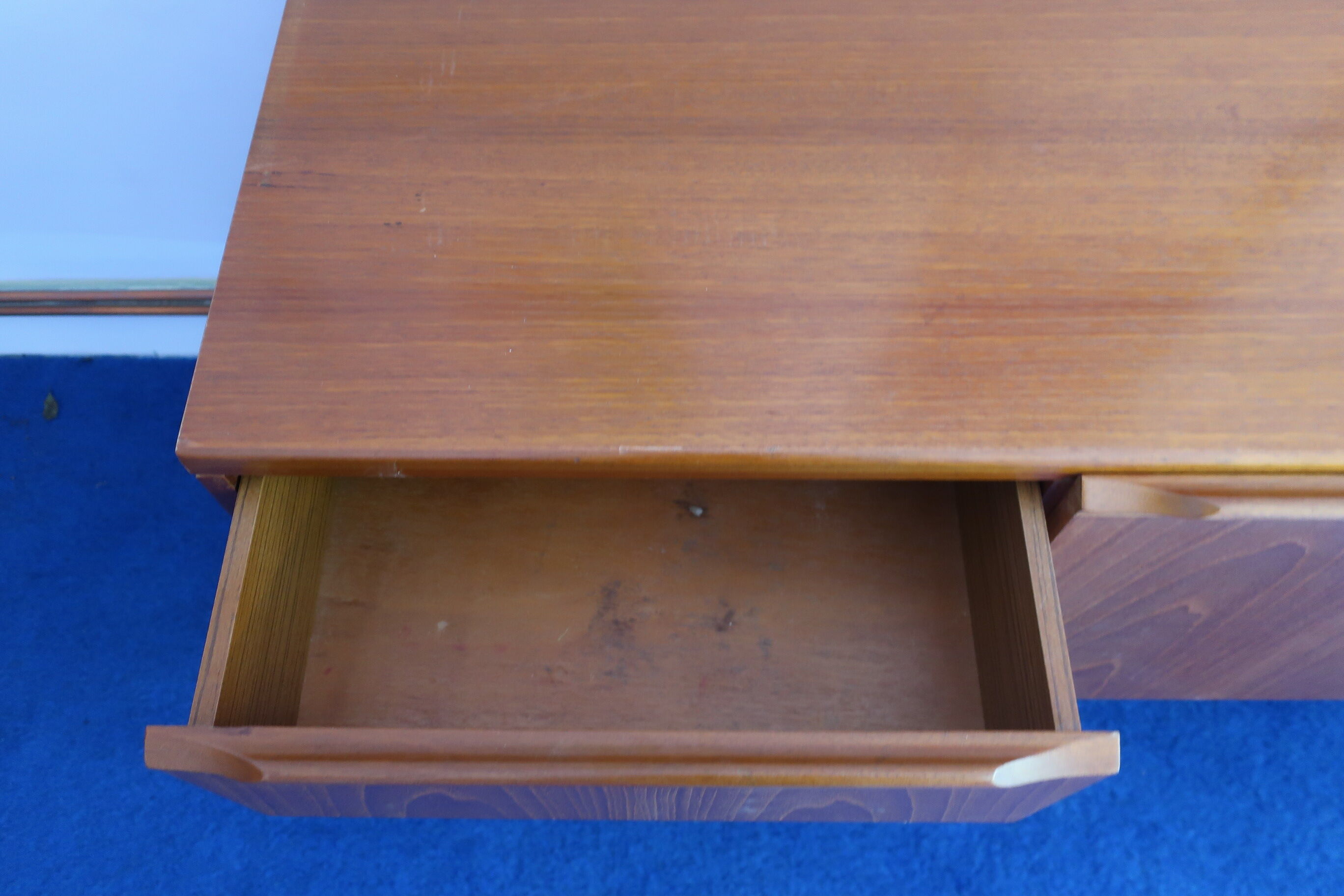 Teak sideboard from the 60s/70s pins