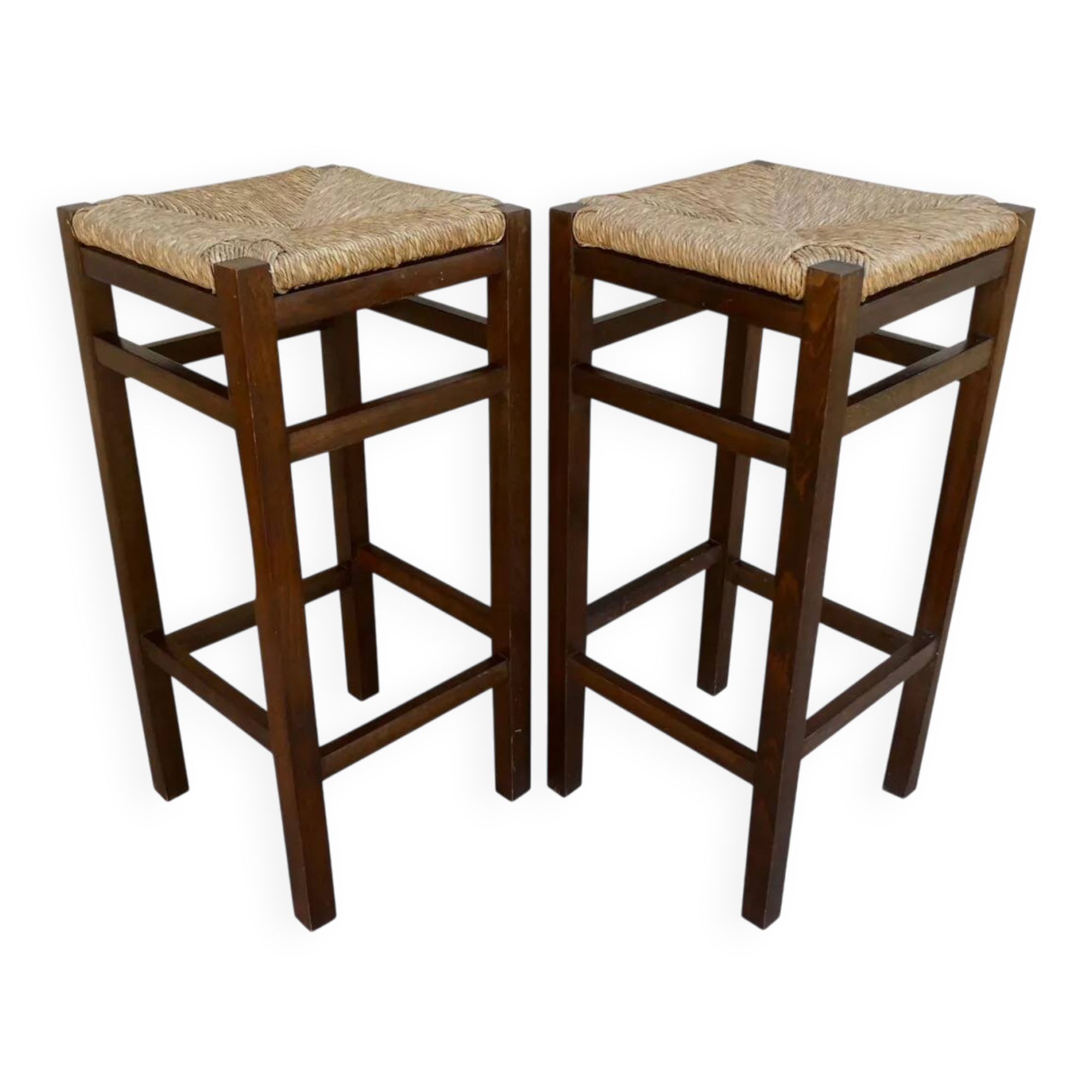 pair of bar stools, made of wood with a straw seat