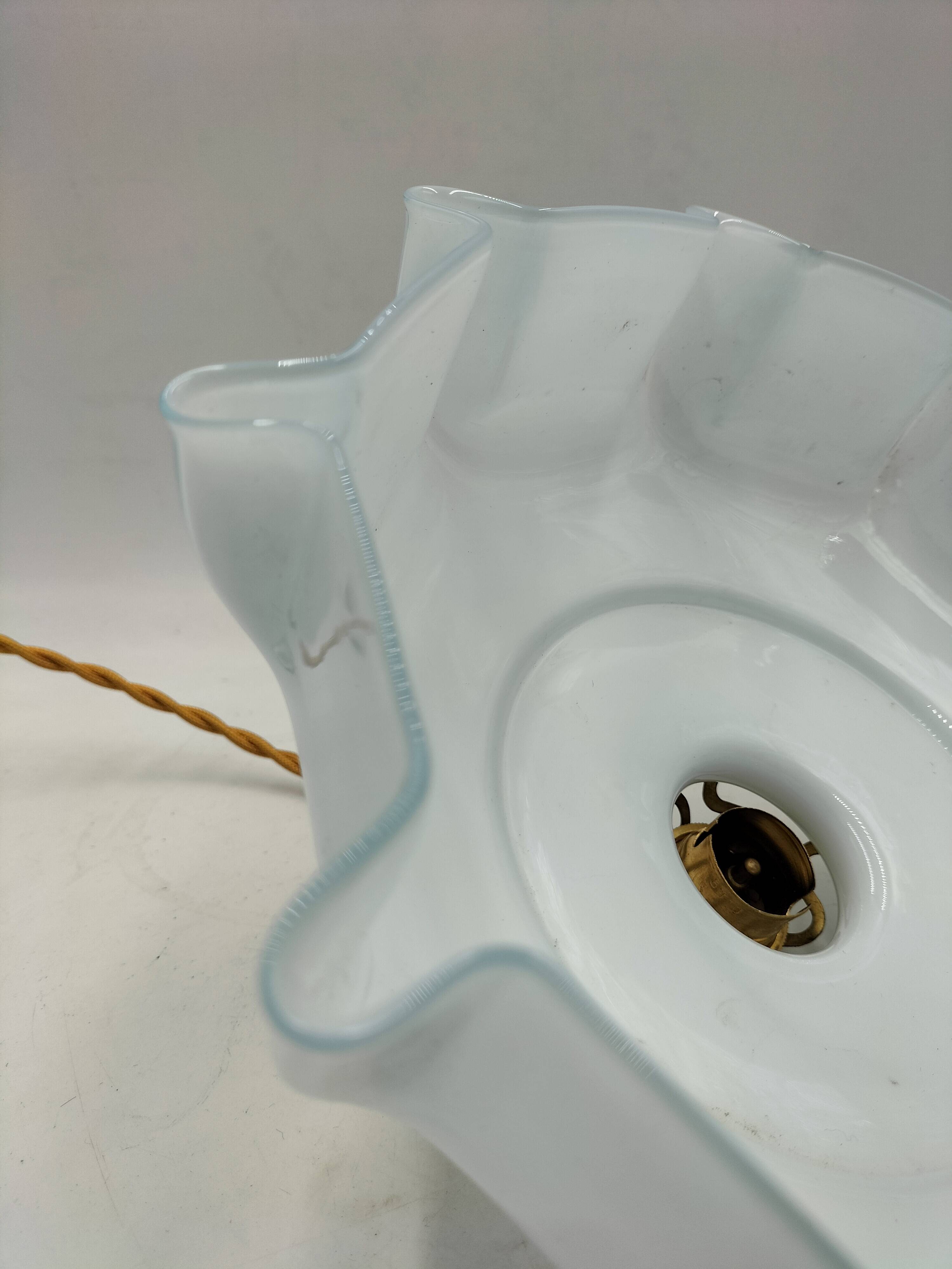 Blue opaline suspension